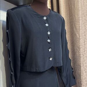 Vintage 1980’s XTRMZ black long split sleeve blouse and mini skirt set. Size S.